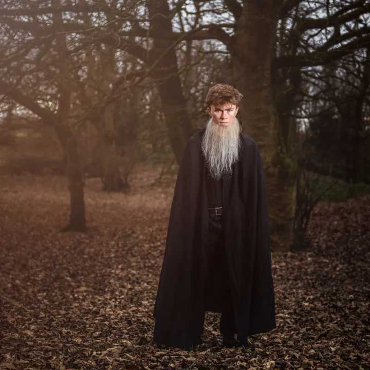 Monk walking the woods 