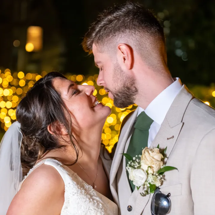 couple at night with lights