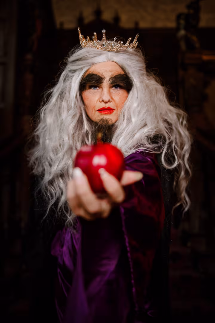 Witch holding an apple