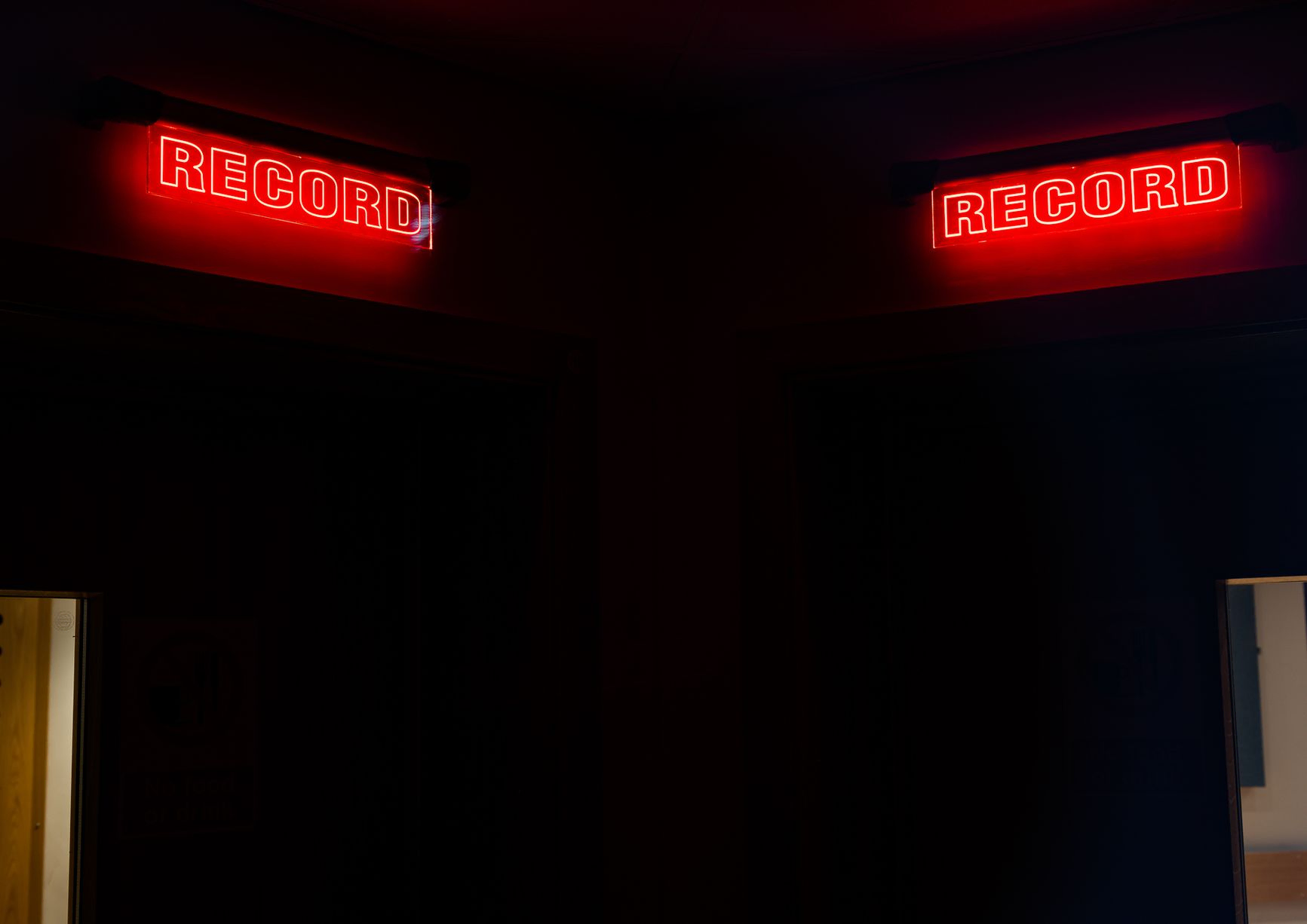Light up signs stating recording