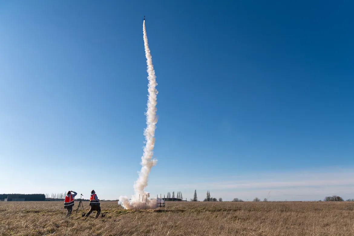 A wide image of a rocket launch high into the sky