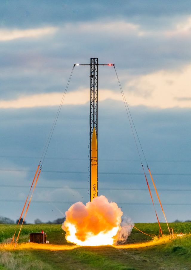 Small yellow rocket launching 