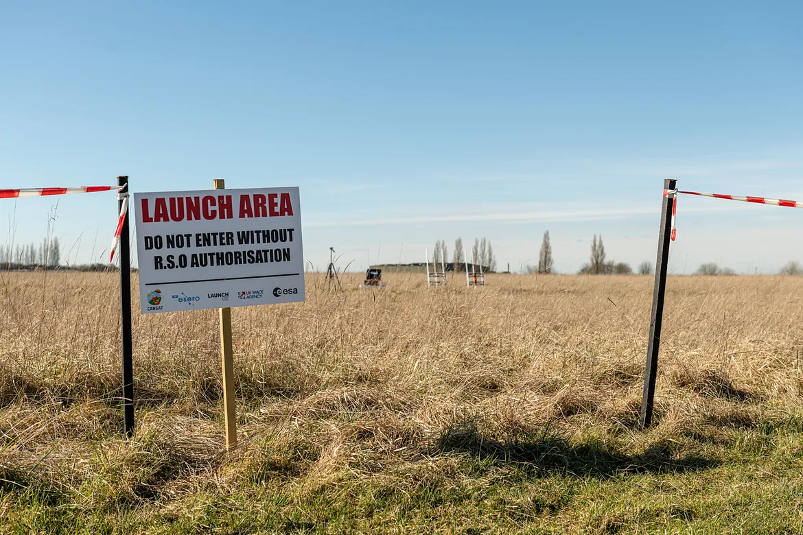 A field with a sign that says R.S.O range safety officer 
