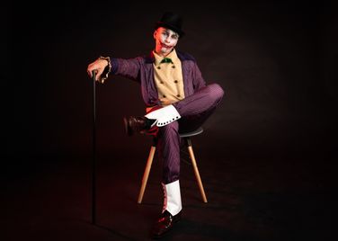 Joker in a chair